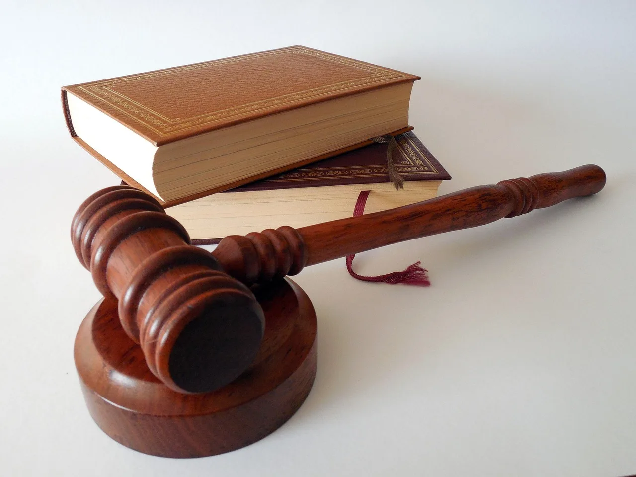 Neoliberal law is described as reorganizing democratic conflict
