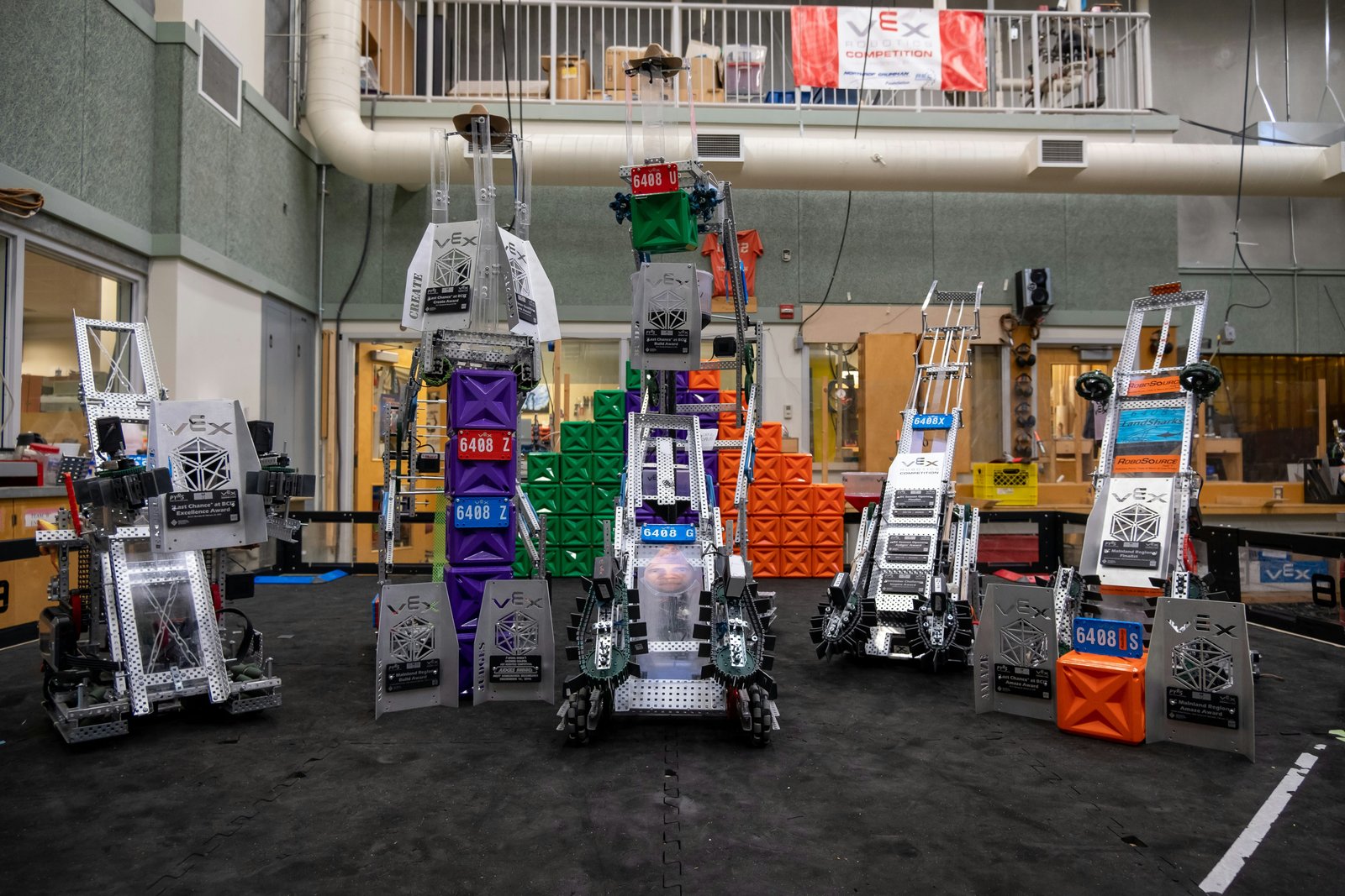 Comparative Analysis of Robotic and Automatic Warehousing Systems with Fuzzy-Based Multi-Criteria Decision Making